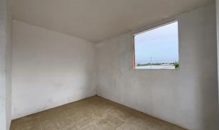 Oportunidad Residencial en Montecristi: Vivienda Bifamiliar con Potencial de Desarrollo